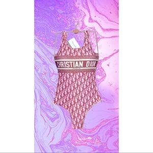 Christian Dior never worn 🩱. Never worn tags still attached. Retail:250$